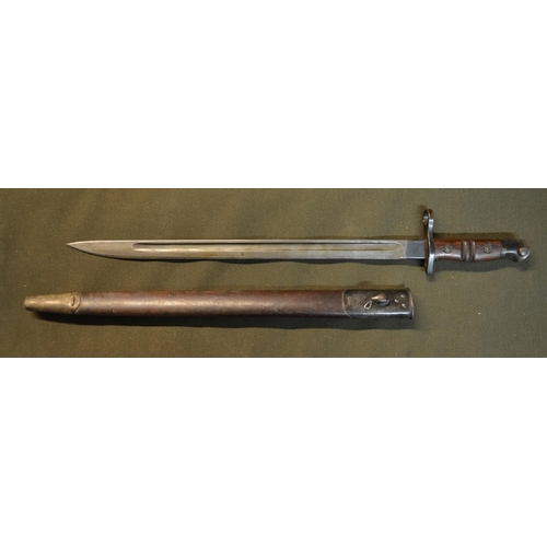 540 - Remington 1913 bayonet, complete with leather sheath