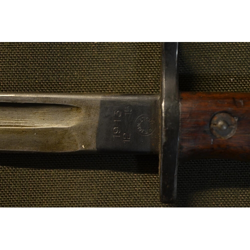 540 - Remington 1913 bayonet, complete with leather sheath