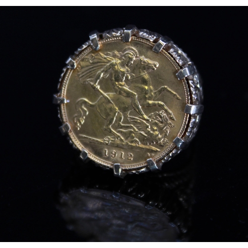 1 - Geo.V 1912 gold half-sovereign ring in 9ct gold scroll mount, stamped 375, size K1/2, 9.3g