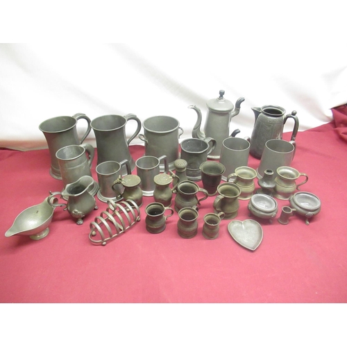 112 - J. Mc Jalsham & Co., Glasgow, pair of pewter quart tankards of wasted design with scroll handles, im... 