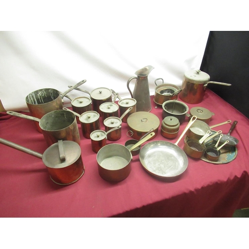 113 - C19th and later copper saucepans, some with riveted steel strap handles, other copper kitchenware in... 