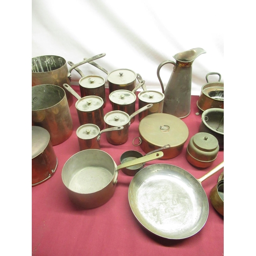 113 - C19th and later copper saucepans, some with riveted steel strap handles, other copper kitchenware in... 