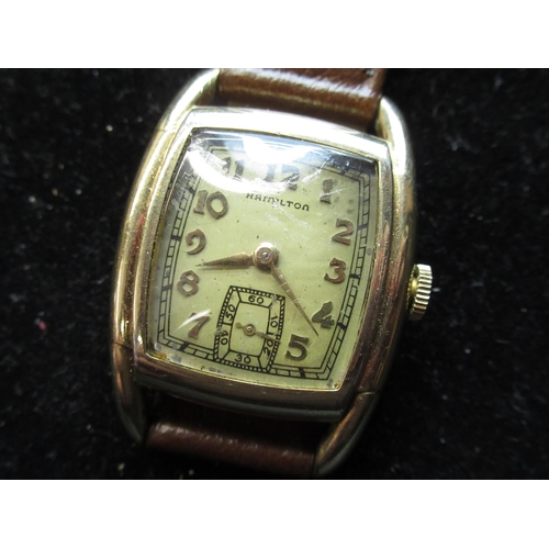 87 - 1940's Hamilton Wadsworth gold filled hand wound wristwatch on leather strap, stepped Tonneau case w... 