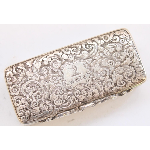 71 - Victorian hallmarked silver table snuff box, finely chased in floral swag and scroll engraved decora... 