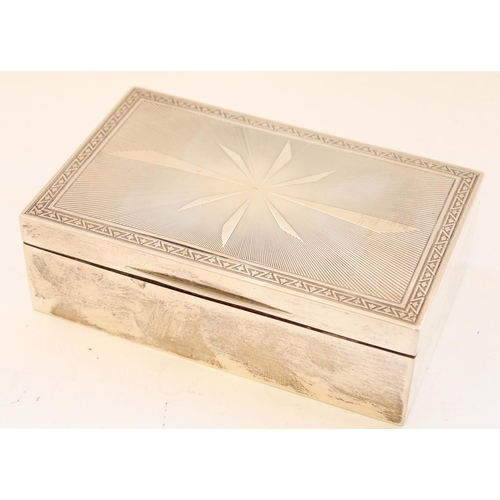 72 - Geo.V hallmarked silver cigarette box, with engine turned starburst decoration to front with symmetr... 