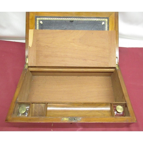 262 - Late Victorian figured mahogany brass bound writing slope, with brass escutcheon and cartouche, fitt... 