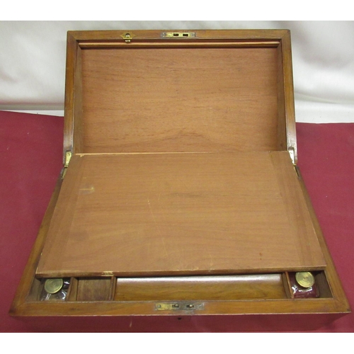 262 - Late Victorian figured mahogany brass bound writing slope, with brass escutcheon and cartouche, fitt... 