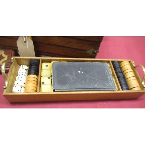 266 - Late Victorian Gothic revival oak cased and brass bound games compendium, with engraved fretwork bra... 