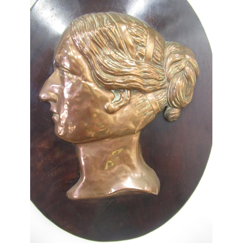 267 - Early C20th embossed copper bust portrait of young Victoria, on oval figured mahogany plaque , with ... 