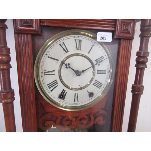 285 - Early C20th American Vienna style walnut cased wall clock, architectural pediment over glazed panell... 