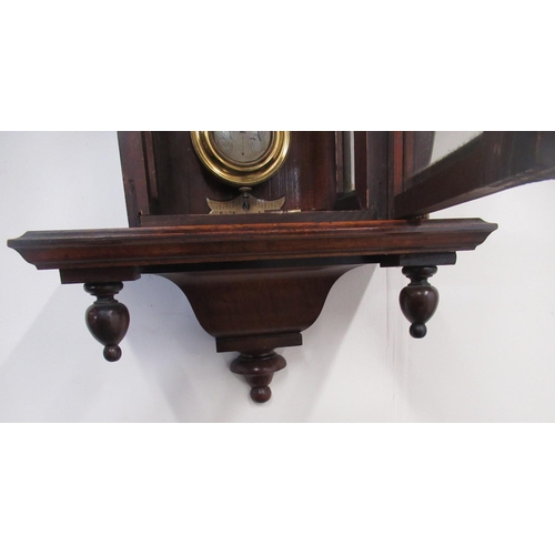 287 - Early C20th continental Vienna style walnut cased wall clock, carved pediment with turned finials, o... 