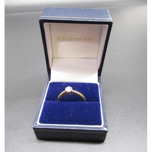 150 - 18ct hallmarked gold single stone diamond ring, stamped 750, size L1/2, 4.3g