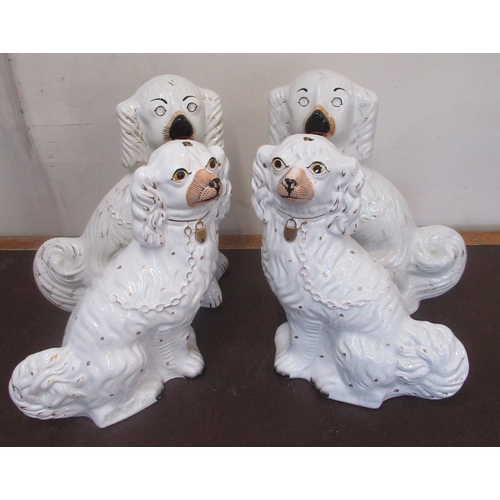 178 - Two pairs of Staffordshire type white spaniels, with gilt painted detail, collars and chains, H36cm ... 