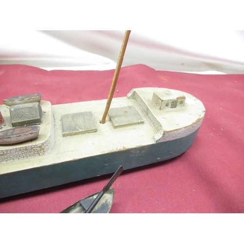 248 - 1950's/1960's child's pull along model of a cargo freighter, L47cm, copper and brass model of a rowi... 