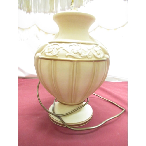 255 - Contemporary ceramic table lamp with urn shaped base in cream and gold finish, H65cm