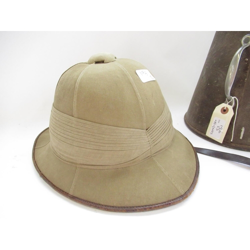 196 - Tress & Co. London 'The Aura' pith helmet, Indian riding crop with white metal handle, and an Americ... 