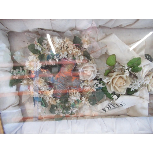 203 - C20th wax and faux flower memorial display, in glazed giltwood frame,