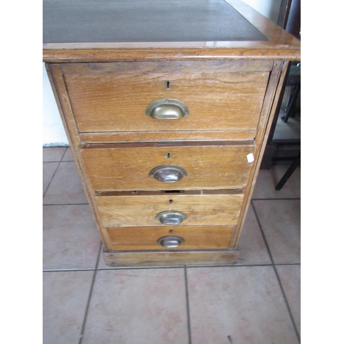 215 - C20th oak twin pedestal desk with inset top and eight drawers, W170cm D80cm H77cm