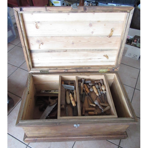 222 - C20th pitch pine joiners tool box containing chisels, saws, brace, scribes etc, W80cm W50cm H36cm