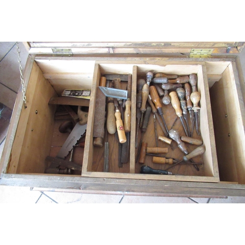 222 - C20th pitch pine joiners tool box containing chisels, saws, brace, scribes etc, W80cm W50cm H36cm