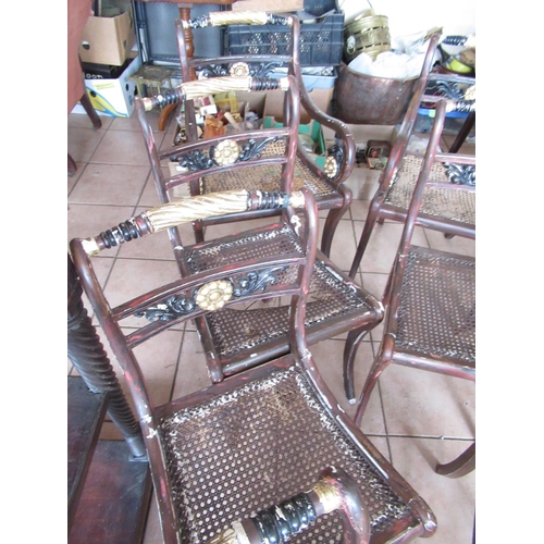 226 - Set of eight Regency style dining chairs, later painted as parcel gilt rosewood, with canework seats... 