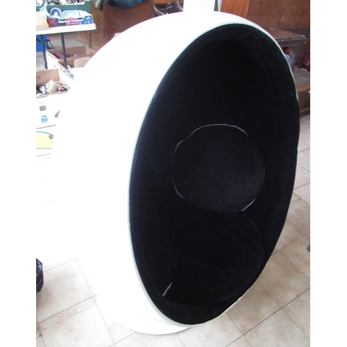 227 - Vintage white finished egg chair, black interior with four cushions on swivel base, H134cm W107cm