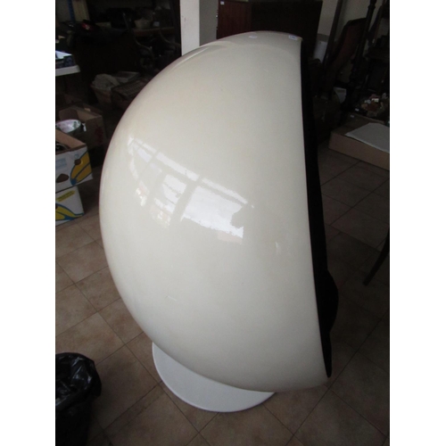 227 - Vintage white finished egg chair, black interior with four cushions on swivel base, H134cm W107cm