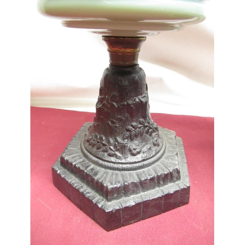 318 - Early C20th oil lamp with opaque glass shade, opaline green tinted reservoir on cast metal base, H55... 