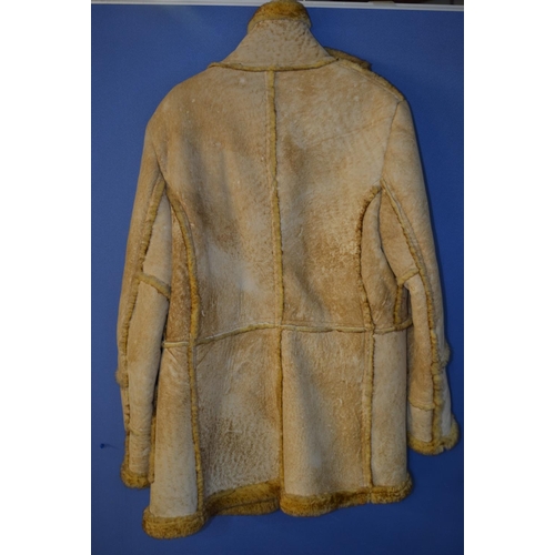 39 - Leather and sheepskin coat, US made, size 48. Little sign of use.
