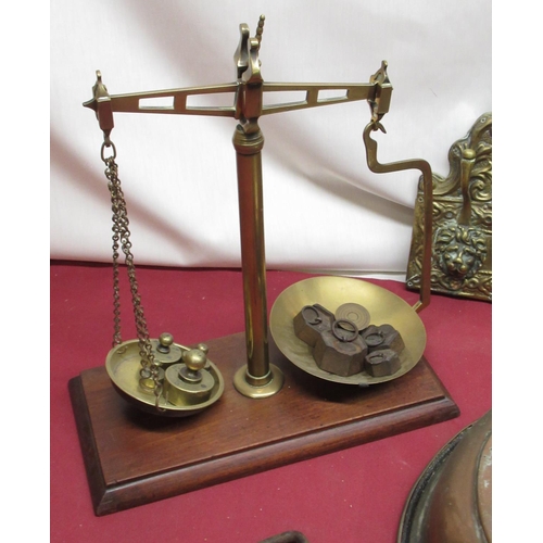 343 - C20th apothecary balance scales on shaped mahogany base with brass pans and a selection of weights, ... 