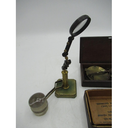 358 - Early C19th mahogany cased apothecary scales with brass pans, early C20th magnifier with ball jointe... 