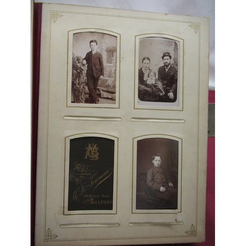 372 - Late Victorian monogrammed photograph album containing carte de visite and cabinet cards, three quar... 