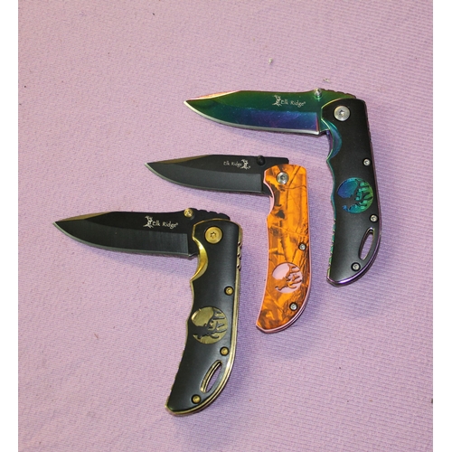 204 - Set of 3 boxed as new Elk Ridge single bladed folding pocket knives in various colours/styles, all w... 