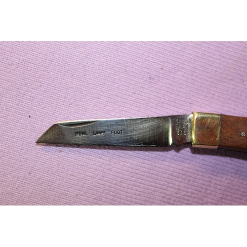 208 - 1 Sheffield made Lambsfoot folding pocket knife with 2 piece rosewood handle. Blade length 8cm, over... 