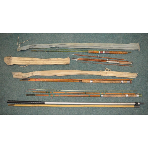 75 - Two landing net handles and four vintage fishing rods:
A Milbro early fibreglass two piece general p... 