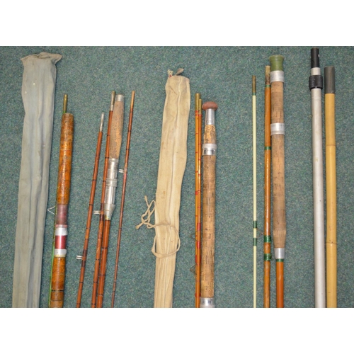 75 - Two landing net handles and four vintage fishing rods:
A Milbro early fibreglass two piece general p... 