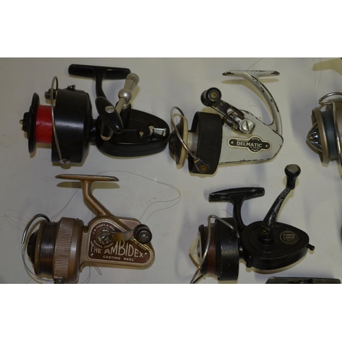 Collection of seven vintage spinning reels including J.W. Young & Sons  Ambidex casting reel, Mitchel