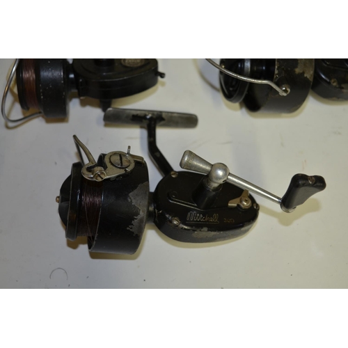 61 - Collection of seven vintage spinning reels including J.W. Young & Sons Ambidex casting reel, Mitchel... 