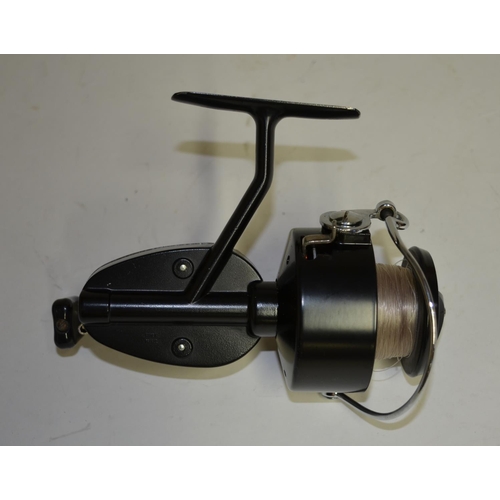 A Garcia Mitchell 300 side arm fishing reel with spare spool and brown leather  bag. Reel in excellen