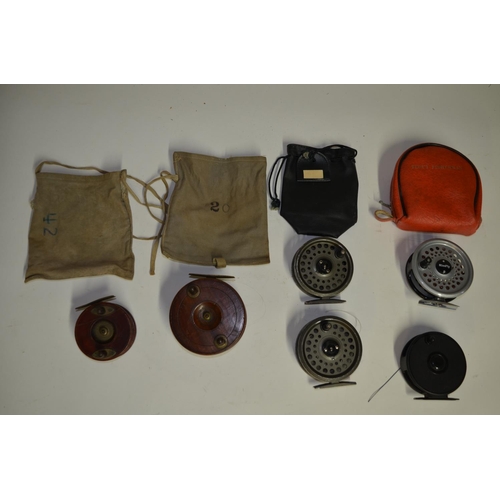 65 - A collection of fishing equpiment including side arm reels, multipliers, centrepin reels, fishing li... 