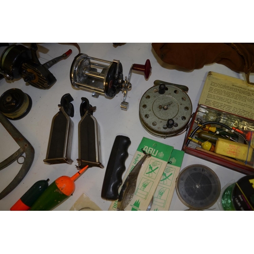 66 - A collection of course and sea fishing equipment including a Gilfin Model 500 multiplier reel, 3 sid... 