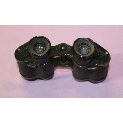 251 - Pair of 1940 dated British military binoculars by Kershaw. (A/F, in need of refurbishment)