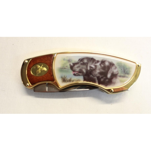 215 - Pair of Franklin Mint pocket knives with ornate engraving to brassware, depicting pike in river and ... 