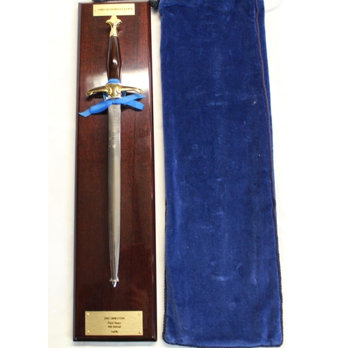 221 - Wilkinson Sword of London medieval style dagger with brass crossguard, rosewood handle and brass pom... 