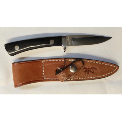 225 - Browning 720 small game hunting knife with full tapered tang, with black Mccarter two piece handle, ... 