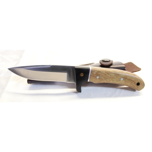 226 - Magnum sheath knife by Boker, full tanged clip blade and two piece wooden handle, steel spacer and e... 