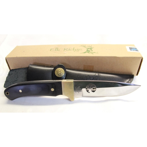 228 - As new Elk Ridge sheath knife, with full tang, ebony handle with brass hilt, blade with pierced stag... 