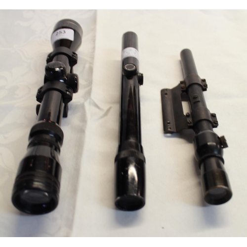 253 - Unmarked rifle scope with mounts, Bushnell Scope Chief 22 rifle scope (lacking adjustable screw cove... 