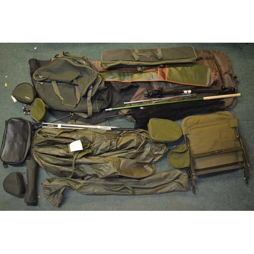 87 - A large collection of course fishing ancillary gear including a hide, fishing seat by Fox Internatio... 