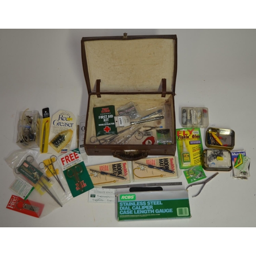 92 - A collection of mostly fishing related tools and accessories, includes forceps, an Orvis knot tyer, ... 